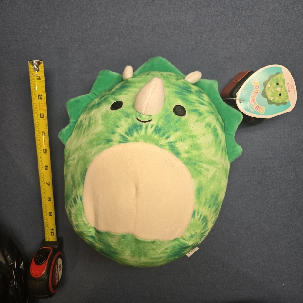 NWT Rocio the Triceratops is a green, tie-dyed Squishmallow.